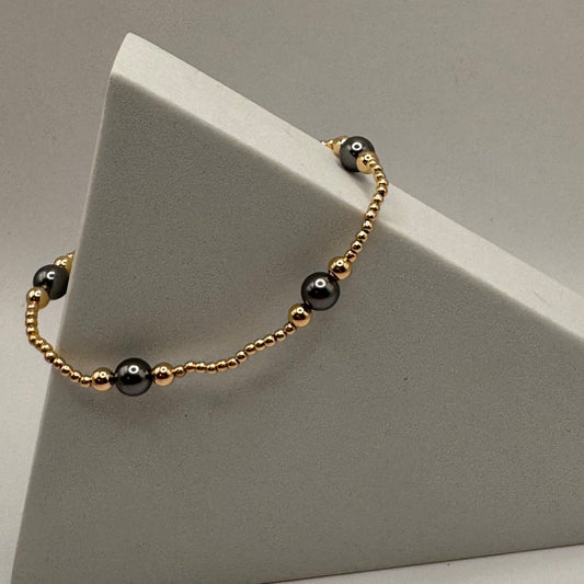 enewton Purpose Pearl Dark Grey 6mm Gold Bracelet