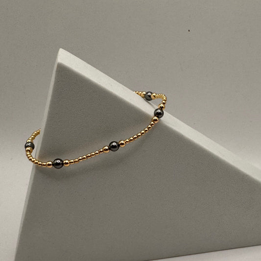 enewton Purpose Pearl Dark Grey 4mm Gold Bracelet